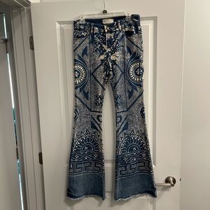 Pattered flare jeans.